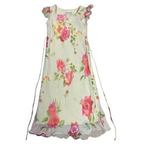 Knee length Jonathan Martin cream colored, flower dress.
